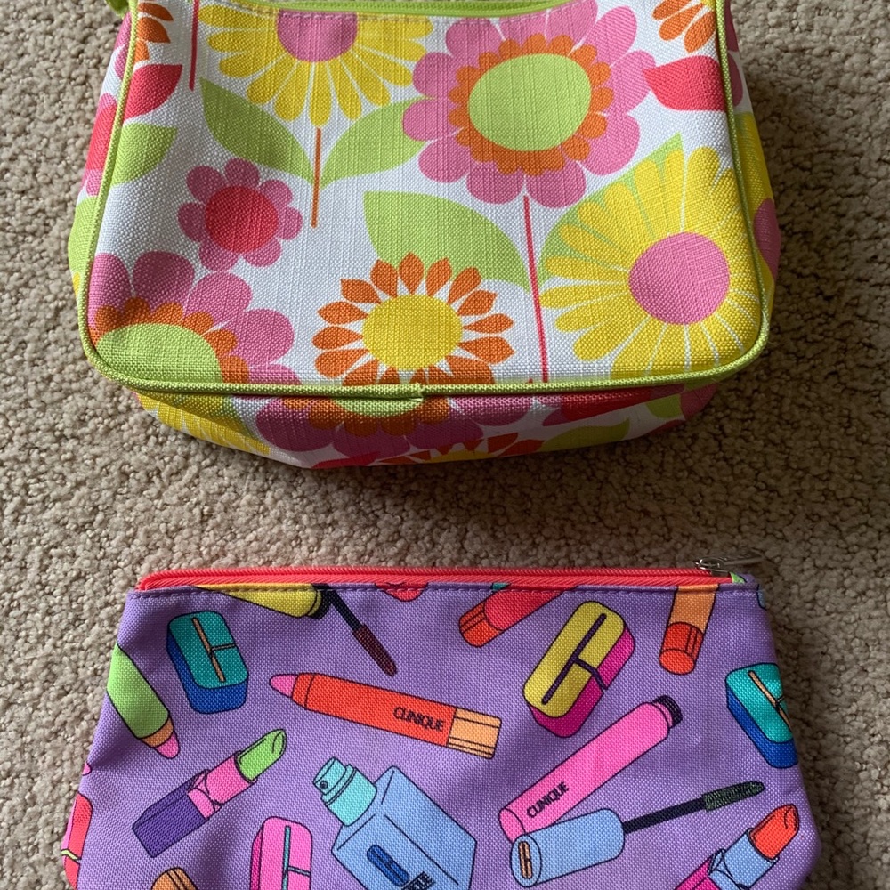 Brand new set of clinique makeup bags